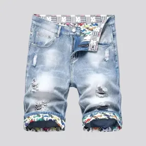 Ripped men's denim shorts